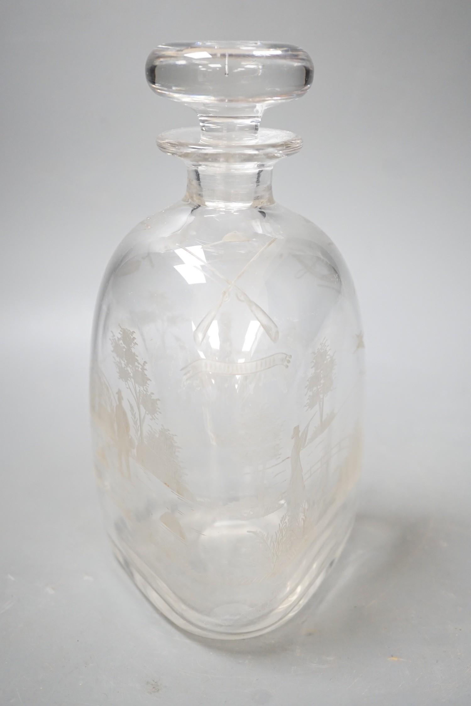 Hunting interest - A Victorian wheel engraved triangular glass decanter, and stopper. 22cm tall